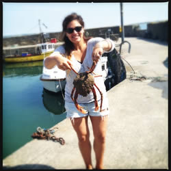 Holding a spider crab which I was going to cook for lunch.
