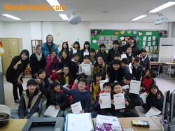 Brian and Noelle with students in Korea.