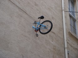One of Montpellier's biggest mysteries. Who are the tiny bicyclists and why do they keep getting their bicycles stuck in second-storey apartments?