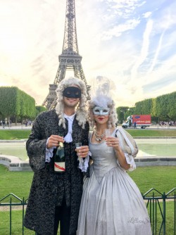 Enjoying drink before the annual Masked Ball at Versailles
