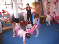 Teaching dance at my kids' preschool. Mostly fun, but as evidenced by the semi-chaos, it is often an exercise in futility thanks to my poor Serbian language skills.