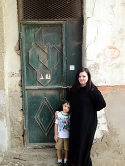 Me and my little one in Al Balad. The black abaya is required to be worn outside here-always!