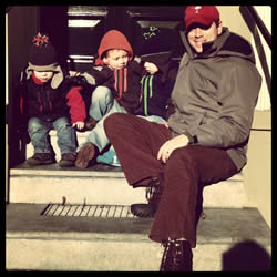 Dad and his crew on a stoop in the City Center of Oisterwijk.