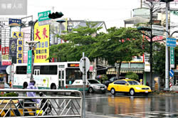 A rainy view from the bus station