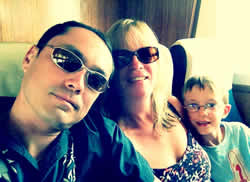 Us three on a boat coming back from yet another desert island (as you do)