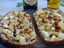 Tvarůžky cheese, seen here on bread, is a protected Czech delicacy