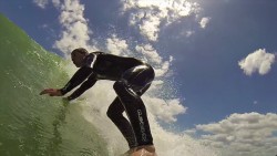 Jordan surfing along Raglan's famous surf break