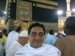 In front of the Holy Kaaba in Makkah for Umrah