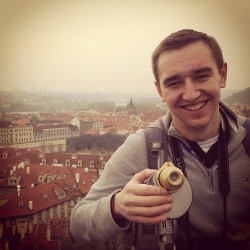 On a writing assignment that focused on Bohemia. A beautiful view of Prague in the background.