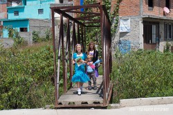 Kids crossing a bridge in our Bible ministry.