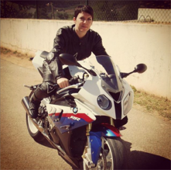 On her husband's BMW bike!