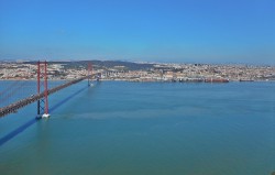 The 25th April Bridge, stretching across the Tagus river